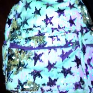 glittery star bookbag .